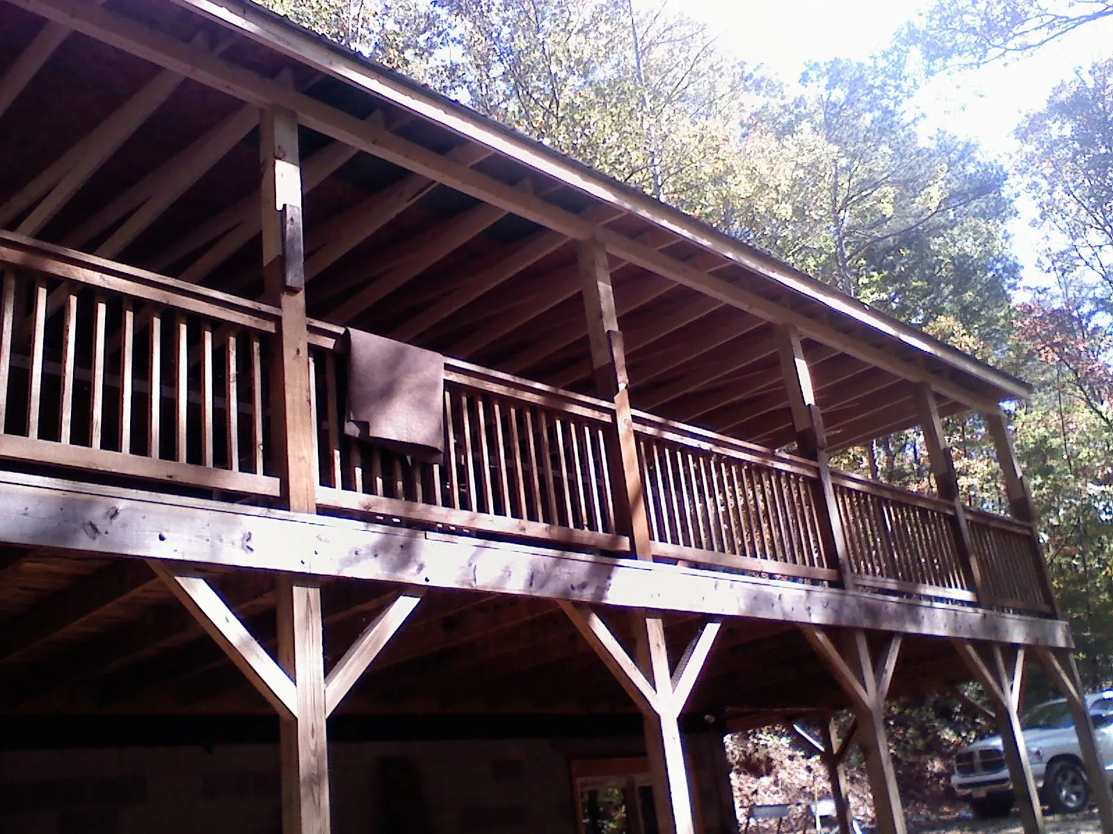 Timber framing under a new elevated porch and deck — Roof Leak Repair in Barnstable by Roofing Brothers